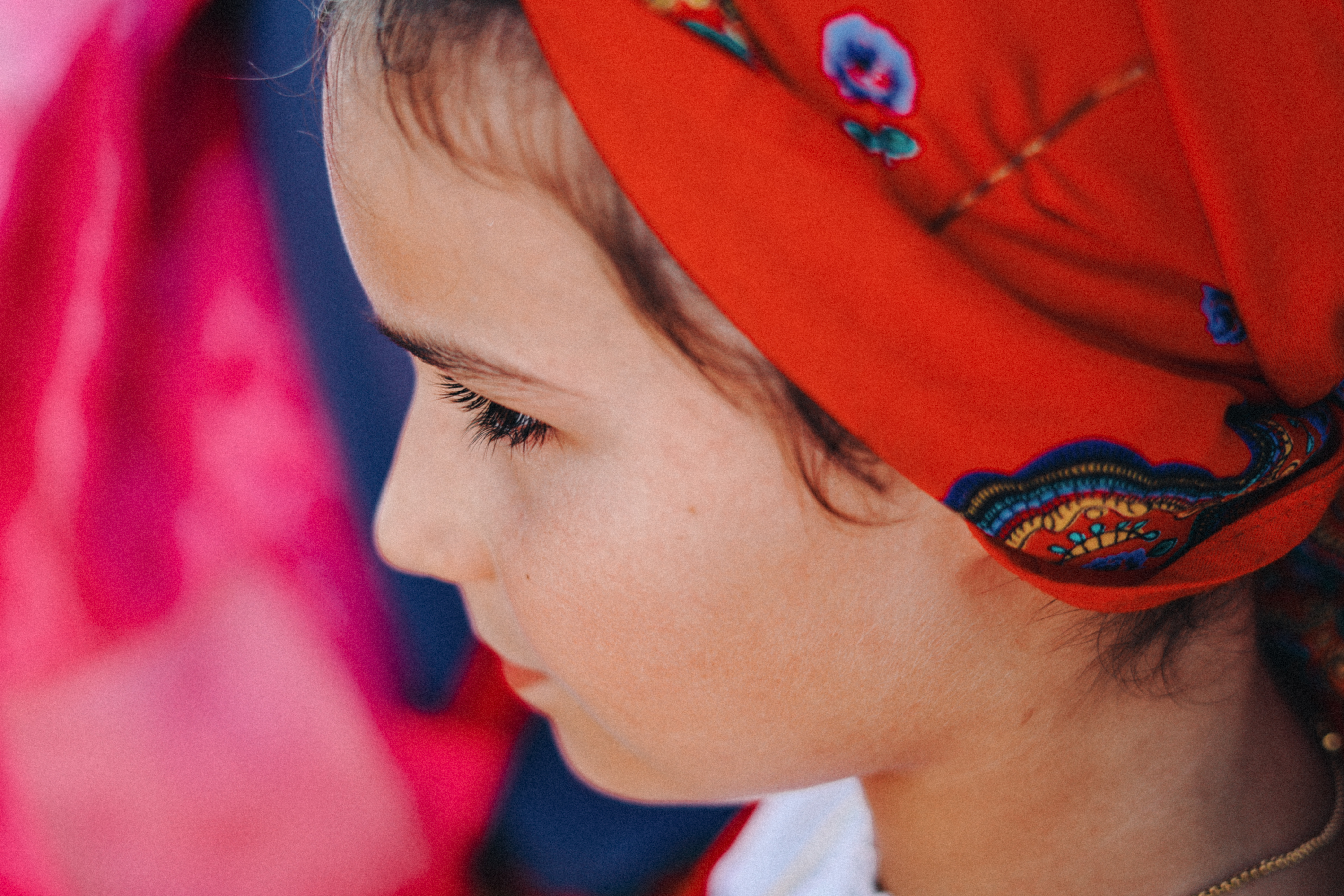 Girl in traditional red folk scarf